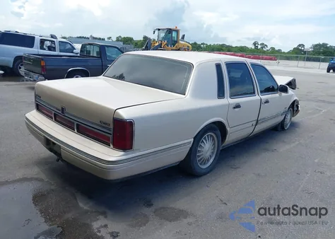 1996 Lincoln Town Car Cartier z USA, uszkodzony, nr VIN 1LNLM83W7TY634343